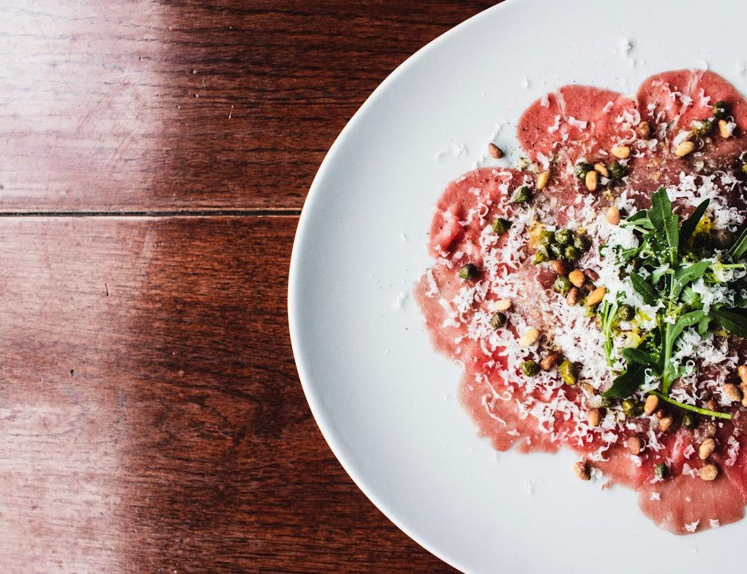 Beef Carpaccio with Arugula and Parmesan — Chapters recipe plated